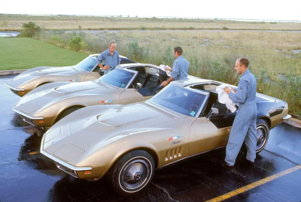 Apollo 12 crew — Conrad, Bean & Gordon — polishing their matching gold Astro-Vettes at Kennedy Space Center.